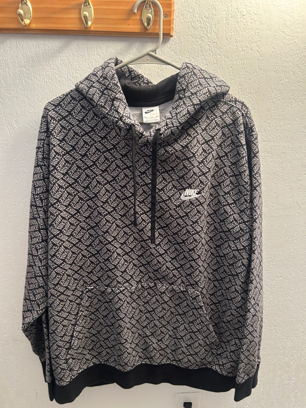 49. Nike Black & White All-Over Logo Hoodie